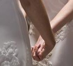 Brides holding hands