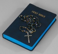 Rosary on Bible